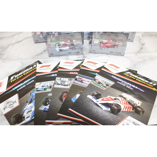 487 - Five Collectable Formula 1 Packed Racing Cars With Five Magazines