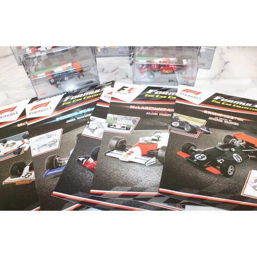 488 - Five Collectable Formula 1 Packed Racing Cars With Five Magazines