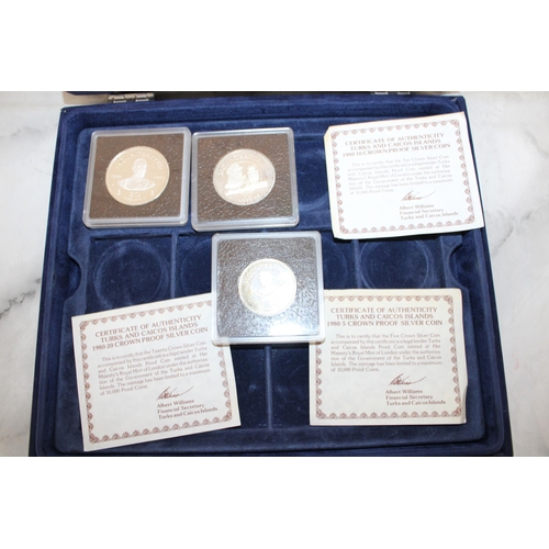 562 - Case Containing Three Coins With Certificates 1980 Silver Proof Coins