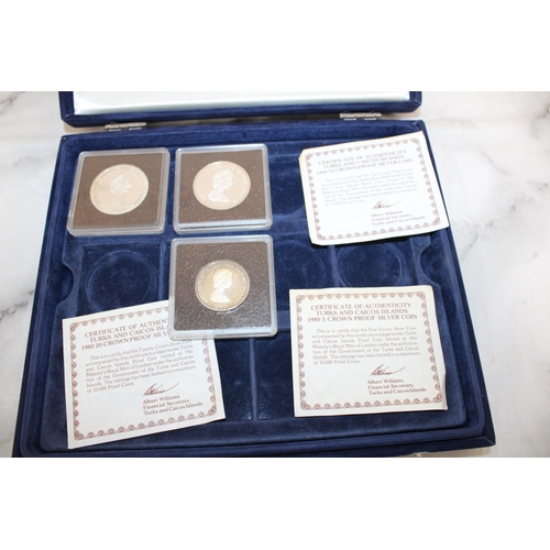 562 - Case Containing Three Coins With Certificates 1980 Silver Proof Coins