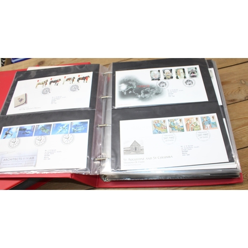 33 - Two Large Folders Containing First Day Covers...