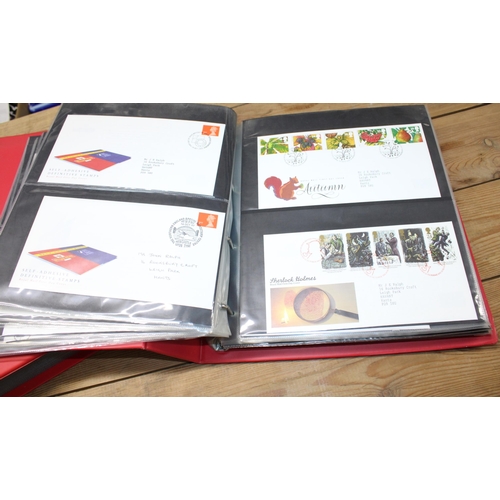 33 - Two Large Folders Containing First Day Covers...