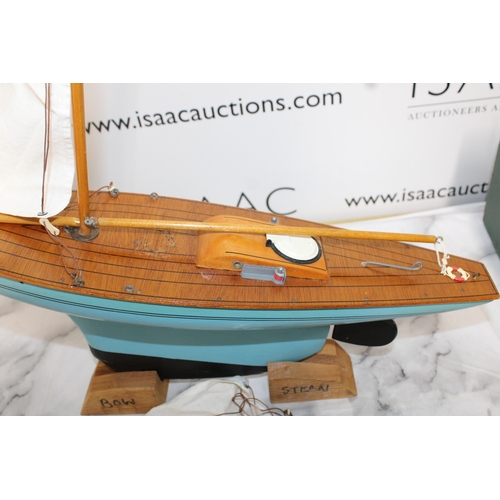 498 - Model Sailing Boat on Plinth - 54cm in Length Approx

Collection Only