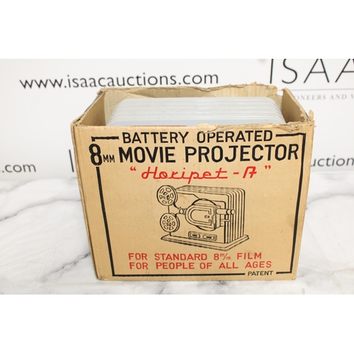 20 - Boxed Battery Operated Movie Projector - Untested

All proceeds go to Charity...