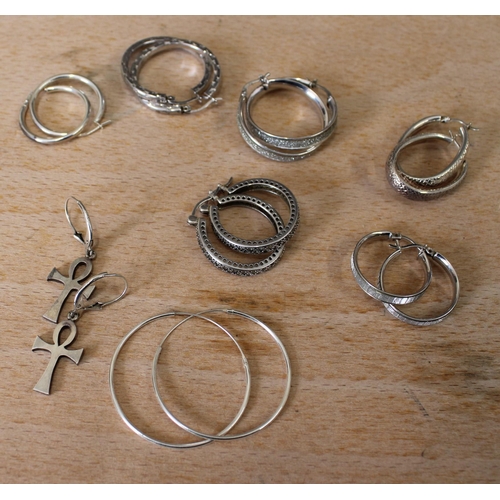 12 - Eight Pairs Of Silver Earrings