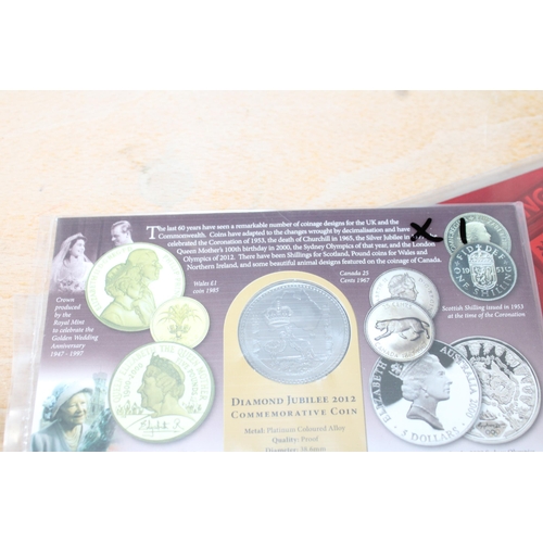 225 - Three Collectable Coins In Packs Inc-
Guernsey Commonwealth Games £2 Coin
1952-2012 Diamond Jubilee ... 