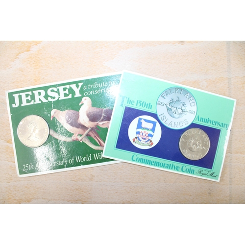 238 - Two Coin Sets Inc-
Jersey 25th Anniversary World Wildlife Fund Coin
Falkland The 150th Anniversary C... 