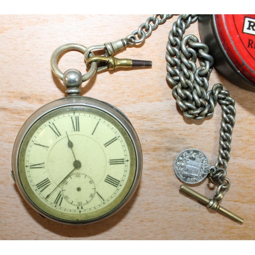 150 - Pocket Watch 5.5cm Diameter (Untested) In A Tin