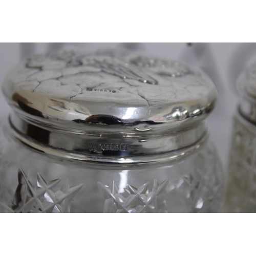 46 - Two Silver Hallmarked Topped Glass Jars & Silver Hallmarked Lid Total Weight Of Lids-49.14g
Tallest-... 