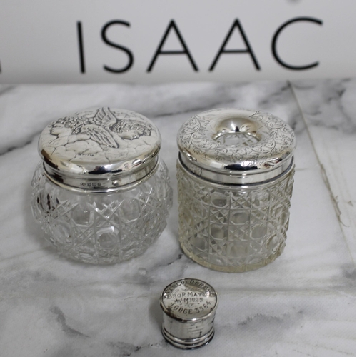 46 - Two Silver Hallmarked Topped Glass Jars & Silver Hallmarked Lid Total Weight Of Lids-49.14g
Tallest-... 