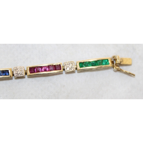 94 - 9k Gold KM Tennis Bracelet 20cm With Rubies, Emerald & Sapphires & Diamonds
In A Box
Weight-7.19g