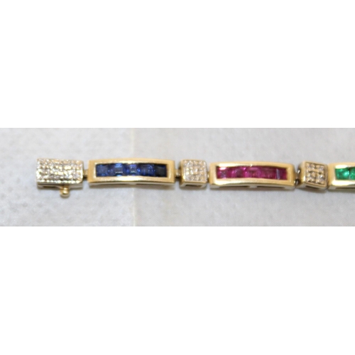 94 - 9k Gold KM Tennis Bracelet 20cm With Rubies, Emerald & Sapphires & Diamonds
In A Box
Weight-7.19g