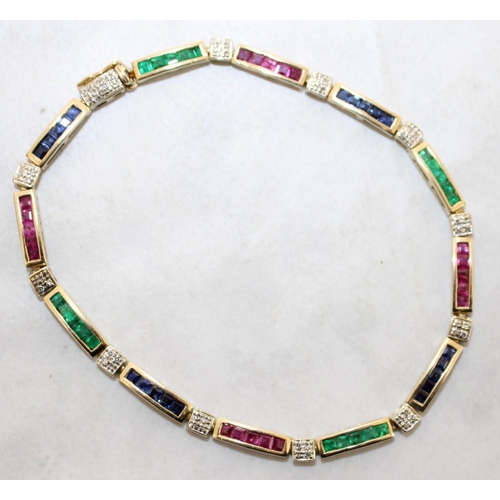 94 - 9k Gold KM Tennis Bracelet 20cm With Rubies, Emerald & Sapphires & Diamonds
In A Box
Weight-7.19g