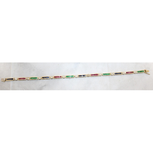 94 - 9k Gold KM Tennis Bracelet 20cm With Rubies, Emerald & Sapphires & Diamonds
In A Box
Weight-7.19g