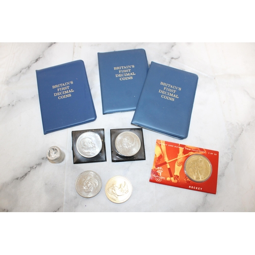 303 - Quantity of Commemorative Coins and Six Pence Holder