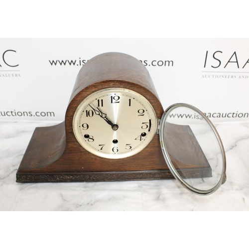 324 - Three Clocks Including Two Mantel and One Swiss Style Clock
One Mantel Clock with Pendulum and Key
S... 