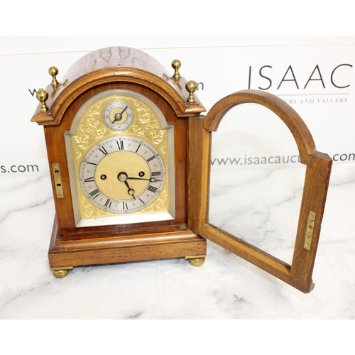 336 - Oak Bracket Clock England c1890 - Brass Corner Finials Complete with Key
Untested Condition