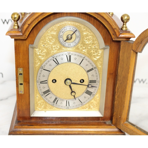 336 - Oak Bracket Clock England c1890 - Brass Corner Finials Complete with Key
Untested Condition