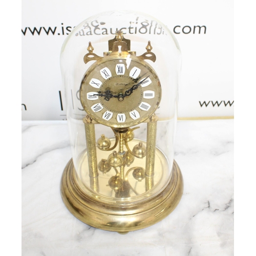 339 - Haller Domed Anniversary Clock

Quartz rotating pendulum, battery AA, Glass Cover - Untested

Collec... 