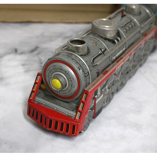 673 - Overland Choo Choo Express Tin Toy Train Engine Untested