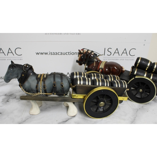 144 - Two Ceramic Horse & Cart 
Collection Only