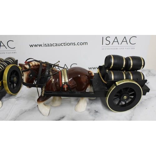 144 - Two Ceramic Horse & Cart 
Collection Only