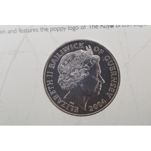 328 - Two collectable Coins Inc-
Boxed The First World War 1914-18 King's Shilling
D-DAY £5 Coin Presentat... 