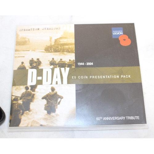 335 - Three Collectable Coins Inc-Jubilee Mint Boxed Lest We Forget 2018 One Crown
D-DAY £5 Coin Presentat... 