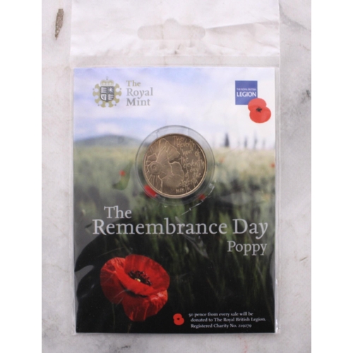 338 - Two Collectable Coin Sets Inc-
The Royal Mint The Remembrance Day Poppy Coin
We Will Remember Them C... 