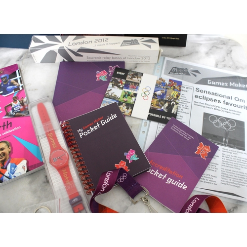 640 - Quantity Of London 2012 Volunteer Memorabilia
Including Swatch Watch in box and Badges ( Bronze, Sil... 