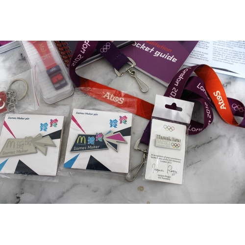 640 - Quantity Of London 2012 Volunteer Memorabilia
Including Swatch Watch in box and Badges ( Bronze, Sil... 