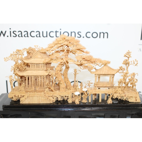 13 - Oriental Cork Carving On Plinth
Collection Only