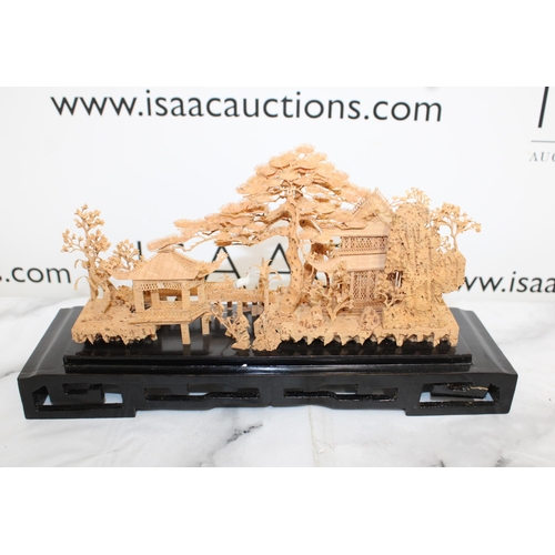 13 - Oriental Cork Carving On Plinth
Collection Only