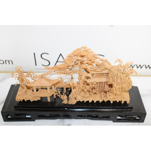 13 - Oriental Cork Carving On Plinth
Collection Only