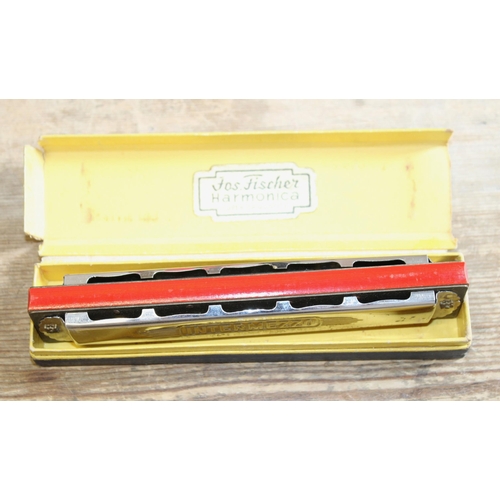 113 - Jos Fischer Harmonica in Case