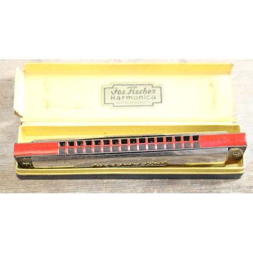 113 - Jos Fischer Harmonica in Case