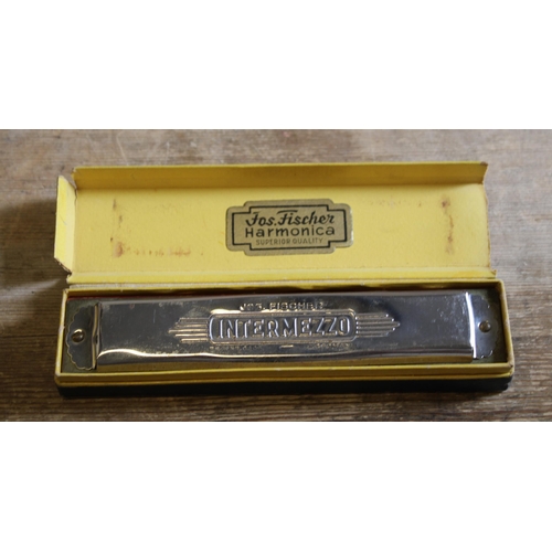 113 - Jos Fischer Harmonica in Case