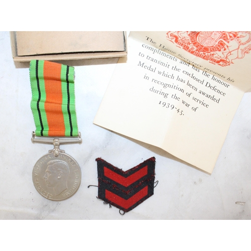 222 - WWII Defence Medal with Ribbon and Entitlement Slip in Box of Issue