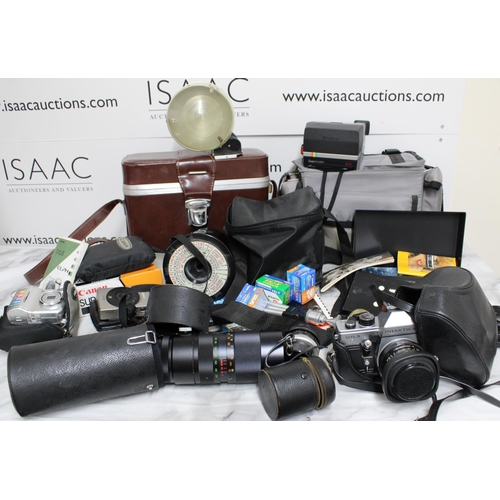 778 - Large Quantity of Camera Equipment including Cameras, Lenses, Cases and Accessories.