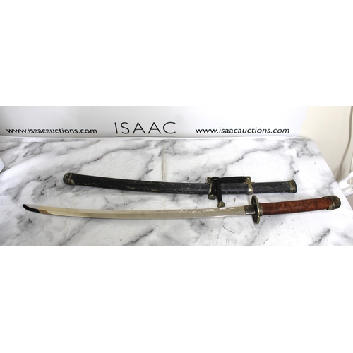 132 - Ceremonial Sword with Scabbard
Collection Only