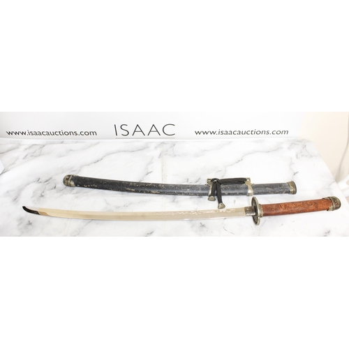 132 - Ceremonial Sword with Scabbard
Collection Only