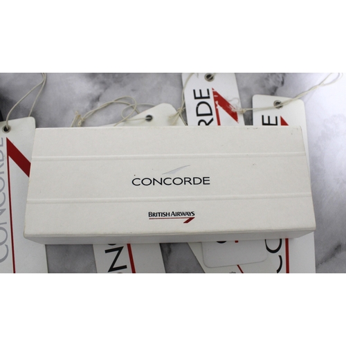 31 - Collectable Items from Concorde

Includes;

Luggage Tags
Travel Clock
Cross Boxed Pen
4 Language Dic... 