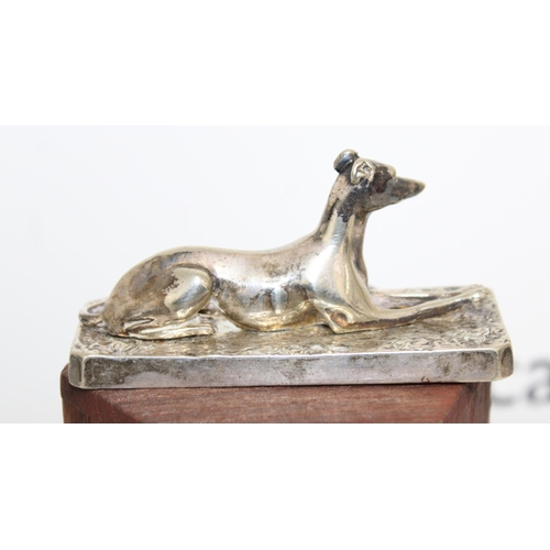 546 - Silver Plated Greyhound On Plinth
Length-9.5cm