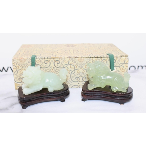 12 - Two Jade Fu Dogs On Stands Boxed
Including Stand Length 8cm