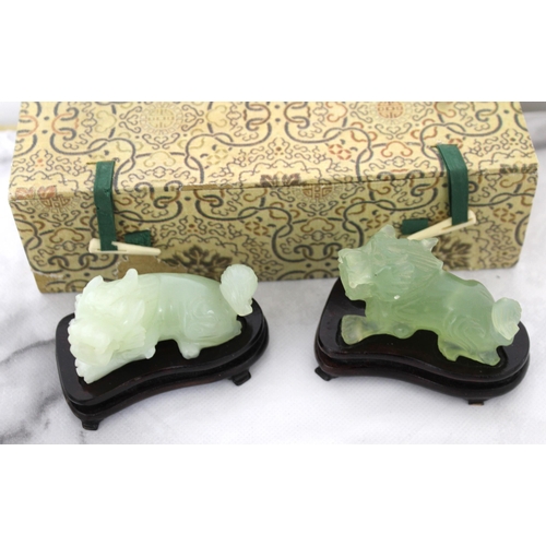 12 - Two Jade Fu Dogs On Stands Boxed
Including Stand Length 8cm