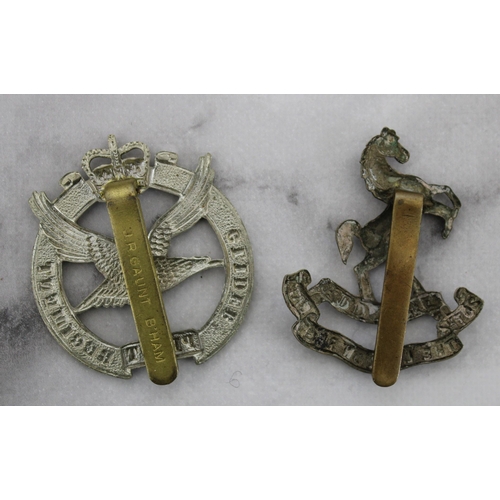 301 - Two Military Cap Badges