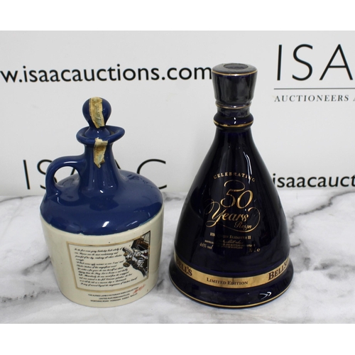 198 - Two Collectable Decanters with Contents Inc-
1952-2002 Aged 8 Years Old Scotch Whisky Bell's Limited... 