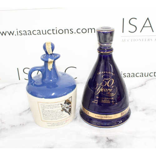 198 - Two Collectable Decanters with Contents Inc-
1952-2002 Aged 8 Years Old Scotch Whisky Bell's Limited... 