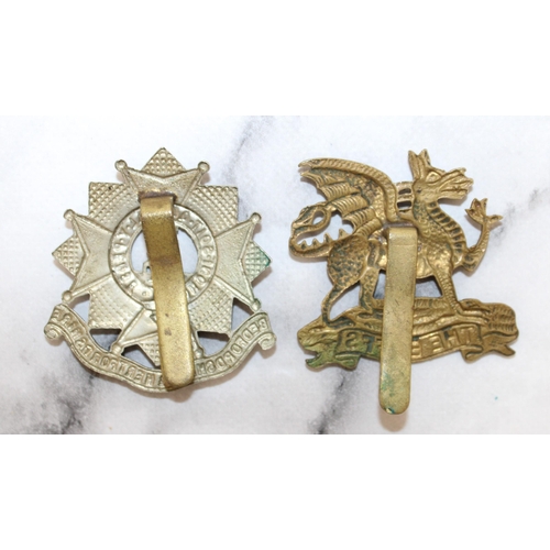 274 - Two Military Cap Badges