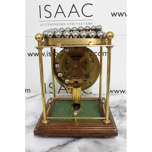 145 - Twaites & Reed Rolling Ball Clock c1950's - Measures 31cm High x 22cm Width

This lot is collection ... 